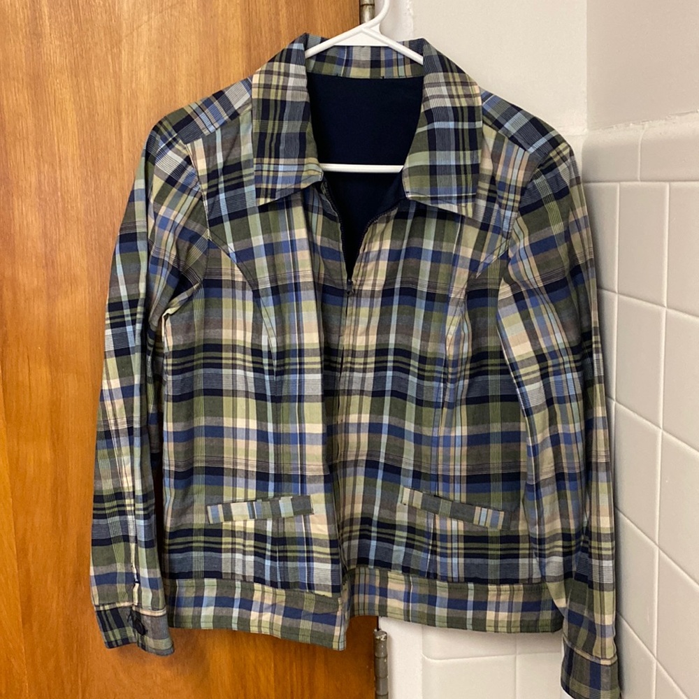 Inside tag is missing however this is a Christopher and banks jacket.